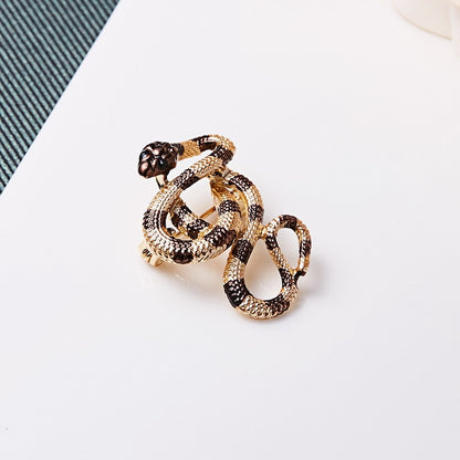 Broșă șarpe aurie cu zirconiu cubic