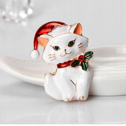 Pisicuță albă de Crăciun cu pălărie de Moș Crăciun - broșă decorativă pentru sărbători
