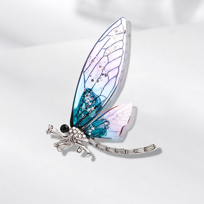 Libelulă cu aripi colorate din rășină - broșă