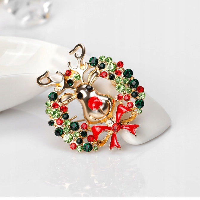 Ren cu o coroană - broșă de Crăciun