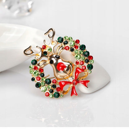 Ren cu o coroană - broșă de Crăciun
