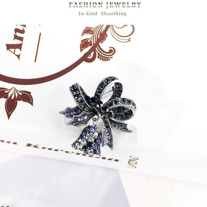 Broșă clopoțel de Crăciun