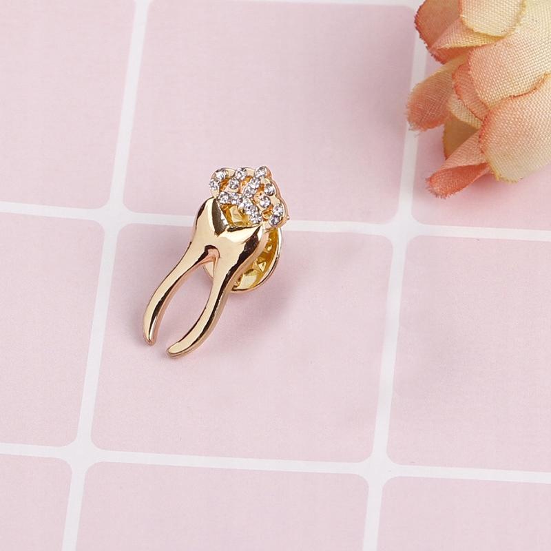 Ząb złoty korona z cyrkoniami - Pinets Polska