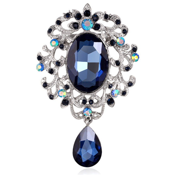 Broșă barocă cu zirconii albastre