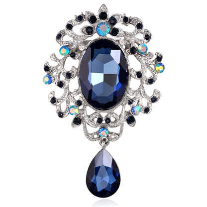 Broșă barocă cu zirconii albastre