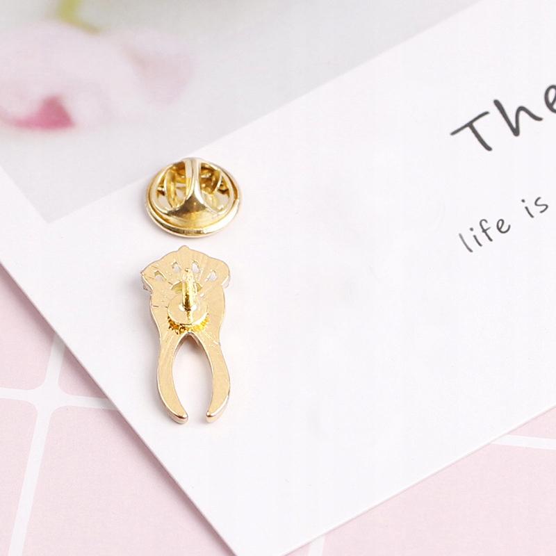 Ząb złoty korona z cyrkoniami - Pinets Polska