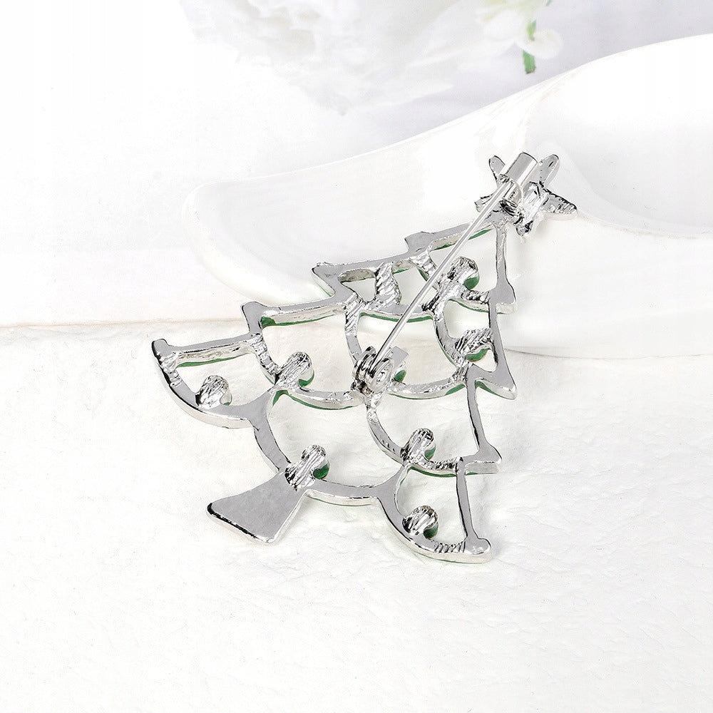 Brad de Crăciun cu zirconiu cubic - o broșă fermecătoare pentru sărbători