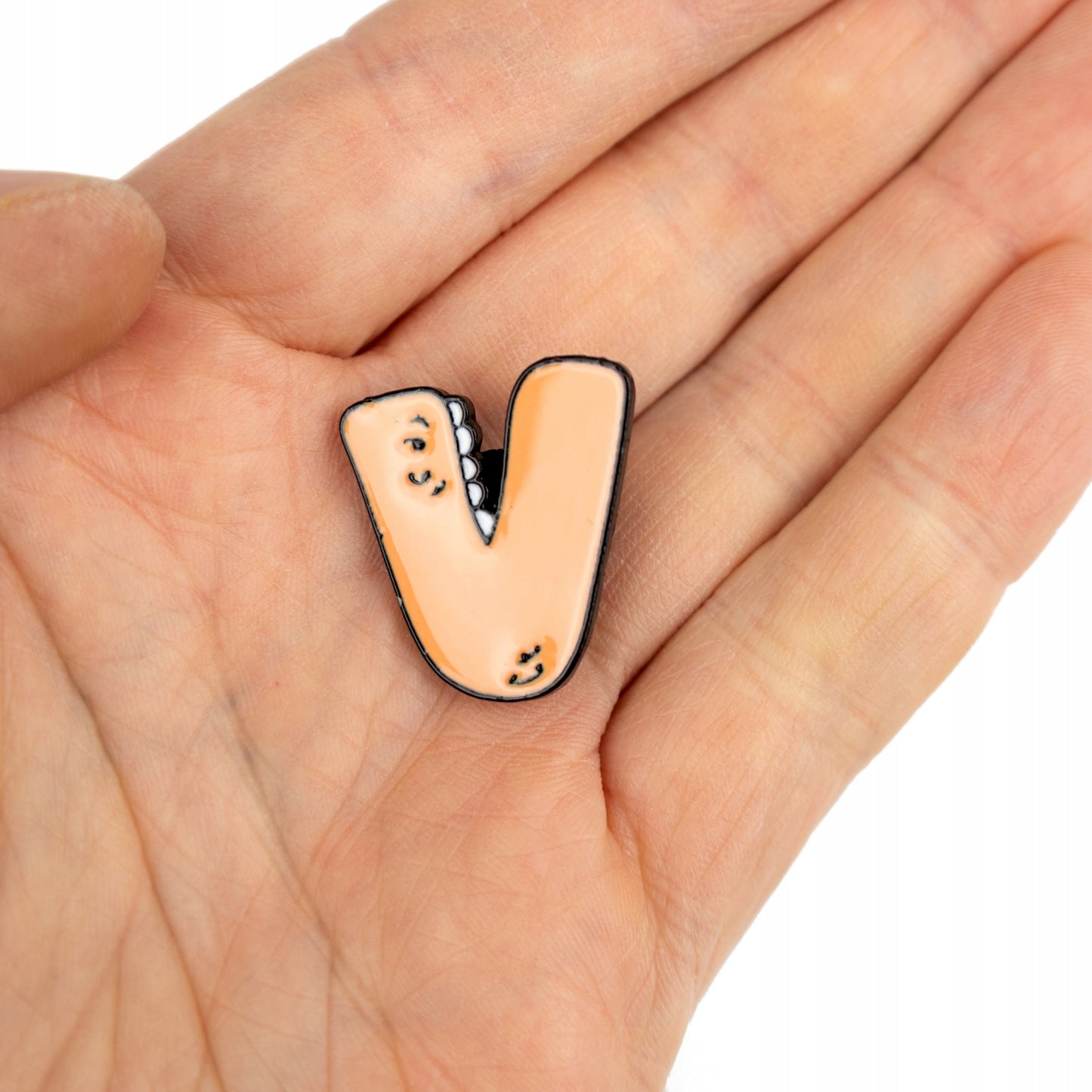 Litera V cu dinți - ac galben