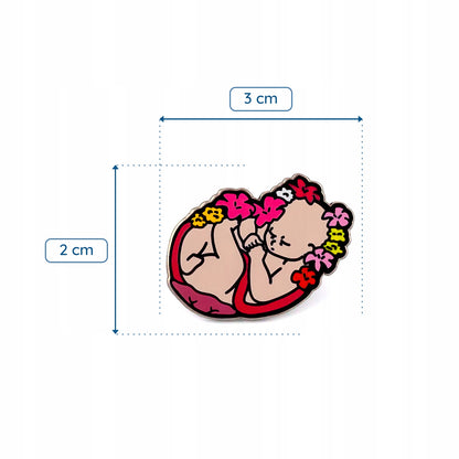 Bebeluș de făt înconjurat de flori - insignă