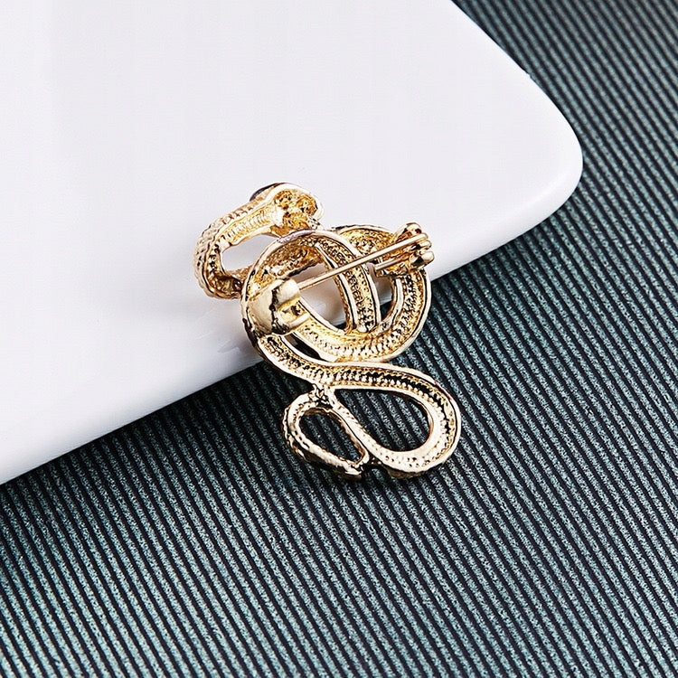 Broșă șarpe aurie cu zirconiu cubic