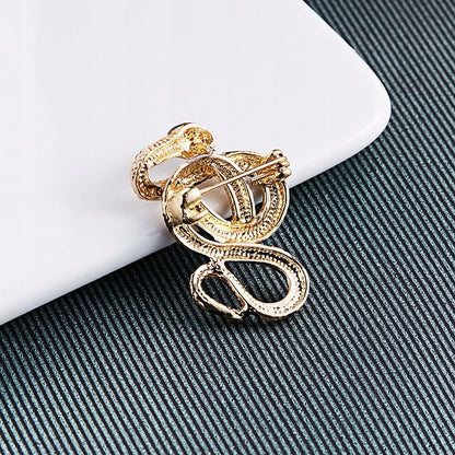 Broșă șarpe aurie cu zirconiu cubic